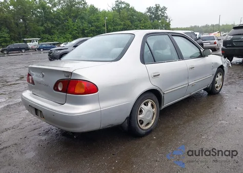 2001 Toyota Corolla Le z USA, uszkodzony, nr VIN 2T1BR12E61C514701